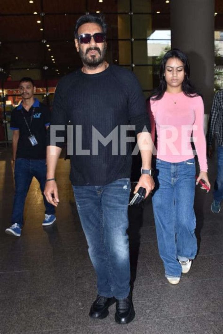 Ajay Devgn gets clicked at the airport with his daughter Nysa. See pics: