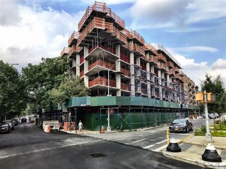 Sharp, Angular and Woody, Massive New Rental Rises at 125 Borinquen Place